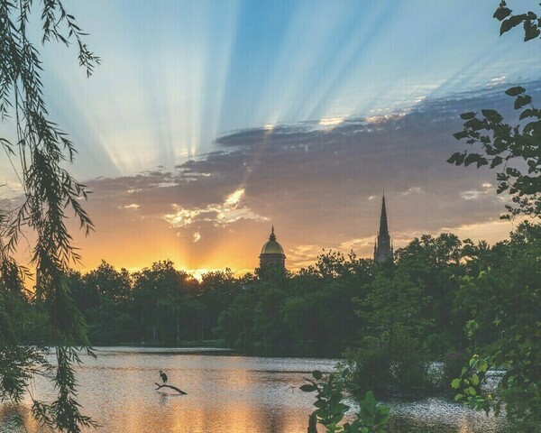 Strategic Framework signature image, sunrise over the lake with the golden dome in the background.